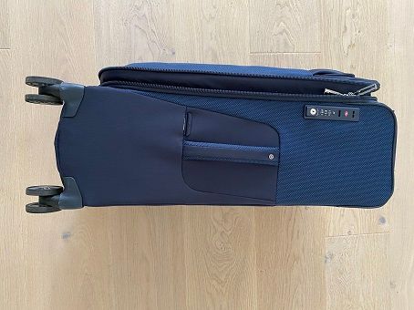 Samsonite B-Lite Icon Spinner - side view with handle and name tag