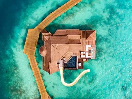 OZEN RESERVE BOLIFUSHI - deluxe water villa with slide in the Maldives